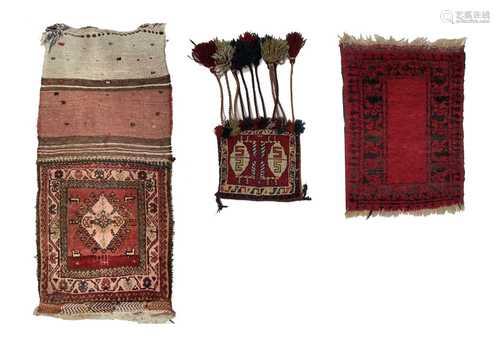 A Ghasghai saddlebag, a Shiraz saddlebag and an Afghan mat, ...