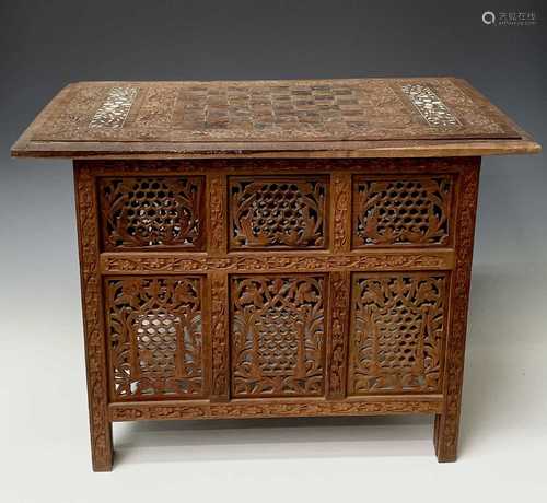 An Anglo Indian carved hardwood occasional table, early 20th...