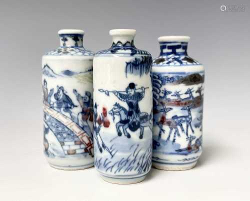 Three Chinese blue and white porcelain snuff bottles, 19th c...