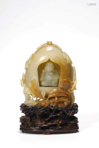 A Carved Russet Jade Maitreya Niche