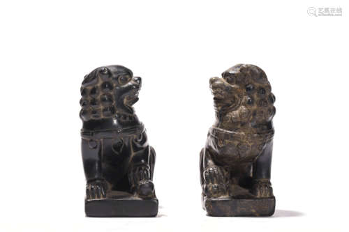 A Pair Of Carved Stone Figures Of Lion