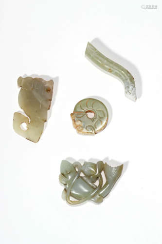 A Set Of Four Celadon Jade Carvings