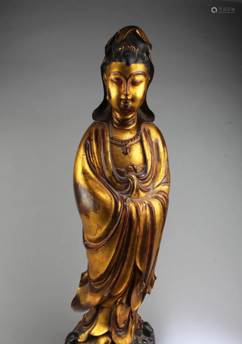 A Carved Gilt Wooden Guanyin Statue