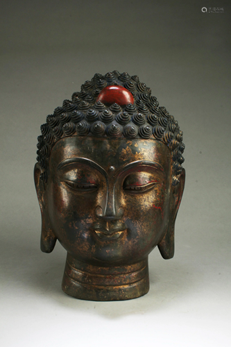 A Bronze Buddha Head