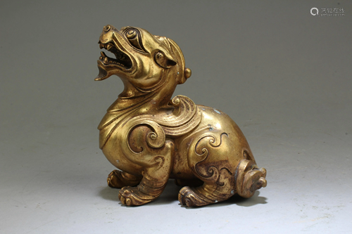 A Gilt Bronze Mythical Beast Statue