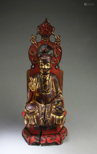A Carved Gilt Wooden Buddha Statue