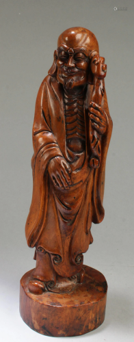 A Carved HuangYangMu Damo Statue