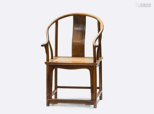 A HUANGHUALI CONTINUOUS HORSESHOE-BACK ARMCHAIR (Y)