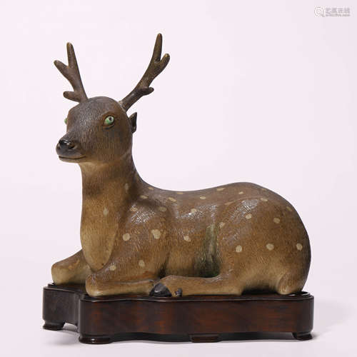 A Chinese Porcelain Recumbent Deer