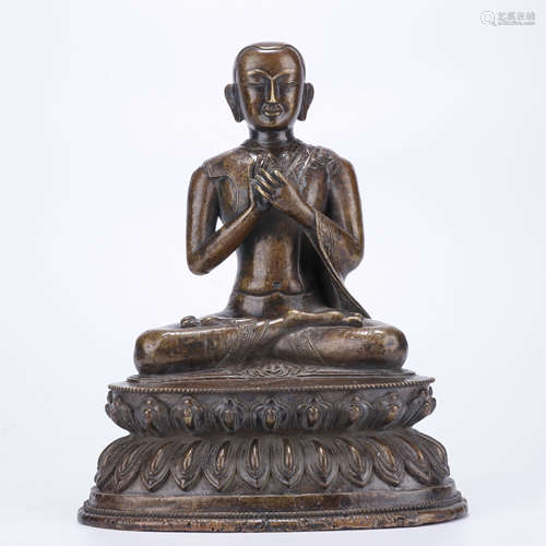 A Chinese Bronze Guru Statue