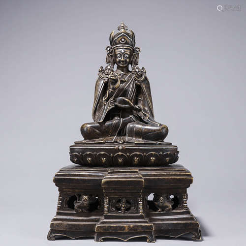 A Chinese Silver Inlaid Bronzze Buddha Statue