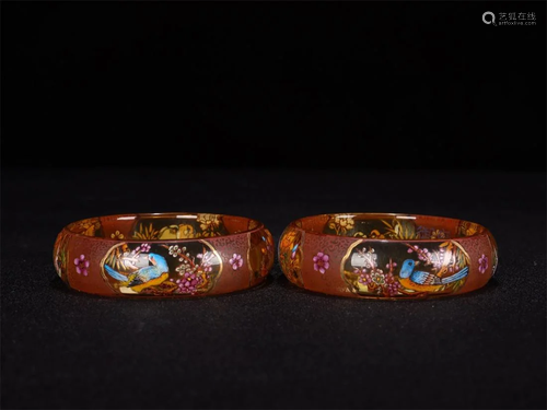 Old stock, a pair of coloured glazed bracelets