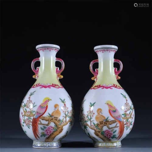 A pair of enamel vases