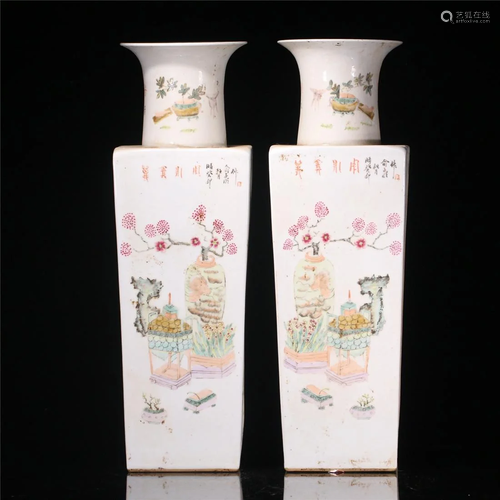 A pair of Qing Dynasty famille-rose vases