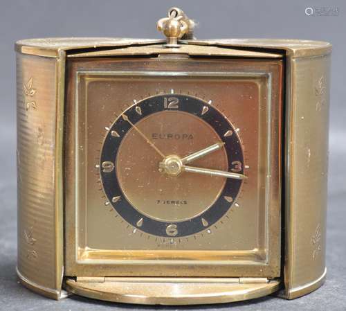 VINTAGE EUROPA TRAVEL CLOCK IN GILT ROSE CASE.