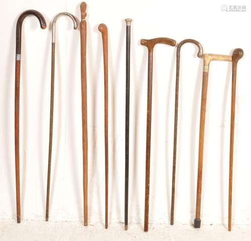 LARGE COLLECTION OF 20TH CENTURY WOODEN WALKING STICKS