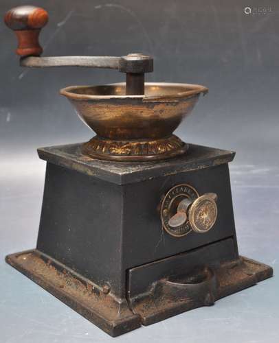 EARLY 20TH CENTURY CAST IRON T & C COFFEE GRINDER