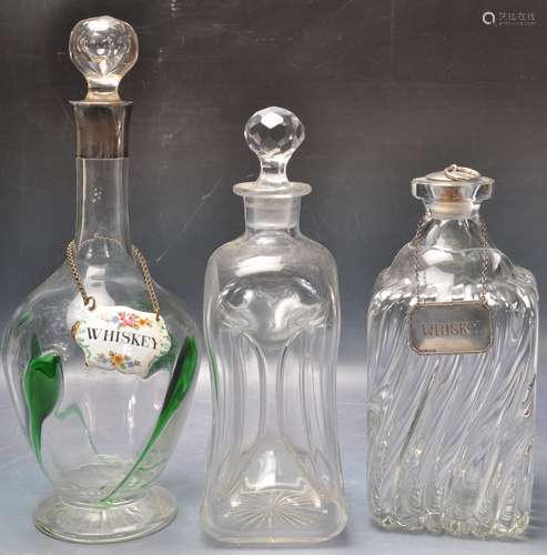 THREE 19TH CENTURY VICTORIAN AND LATER DECANTERS