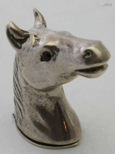 A sterling silver vesta case in the shape of a horse's head,...