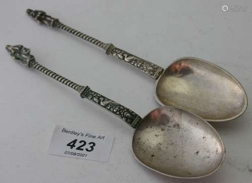 A pair of continental white metal apostle spoons, probably G...