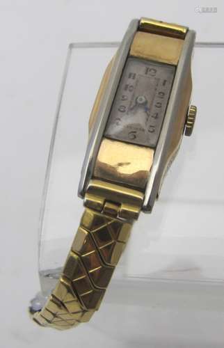 An Art Deco 9ct gold ladies wristwatch with expanding strap....