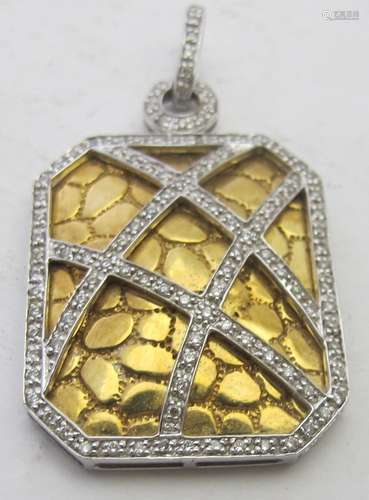 An 18ct white gold rectangular pendant.