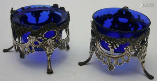 A pair of early Victorian silver salts the open sides decora...