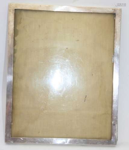 A plain silver rectangular photograph frame, Birmingham 1923...