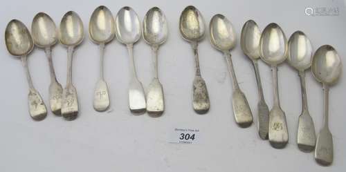 A collection of twelve Georgian and Victorian silver fiddle ...