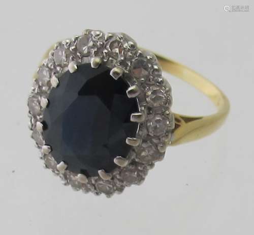 A sapphire and diamond yellow gold cluster ring, sapphire ap...