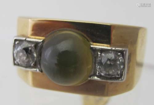 A yellow metal and white metal unmarked ring, tested as 18ct...