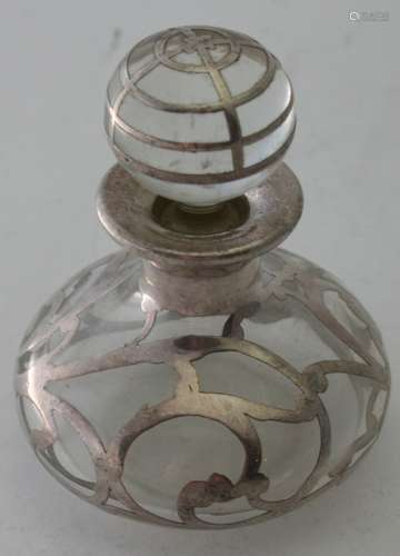 An overlayed white metal glass scent bottle with original st...