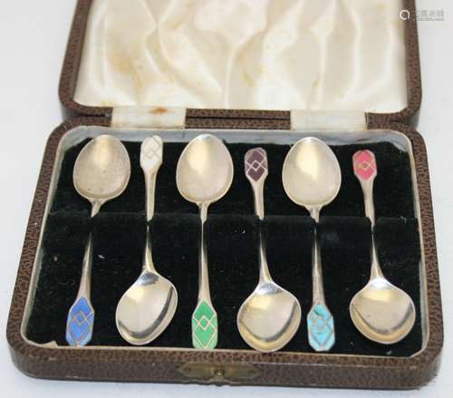 A set of six silver & enamelled coffee spoons, Birmingham 19...