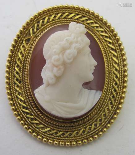 A fine hard stone cameo brooch/pendant set in a yellow metal...