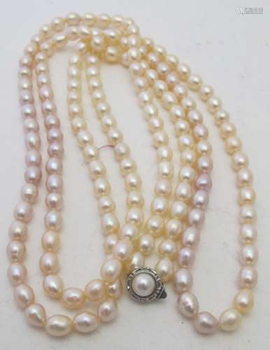 A fresh water pearl necklace with white metal & pearl clasp,...