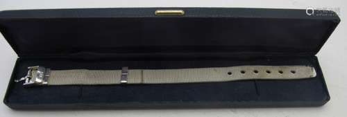 A ladies flexible watch strap, stamped 925, boxed. Condition...