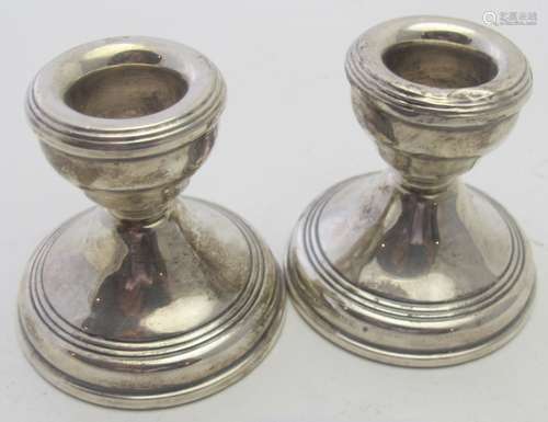 A pair of silver stub candlesticks, approx 2 1/2