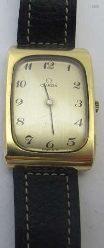 A gentleman's gold plated Omega watch with a Longines strap....