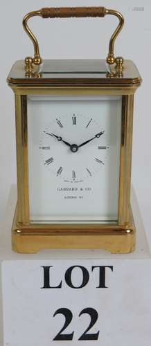 A Garrard and Co brass cased 8 day carriage clock with inscr...