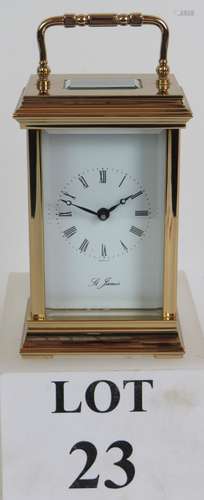 A good quality St James brass cased 8 day carriage clock wit...