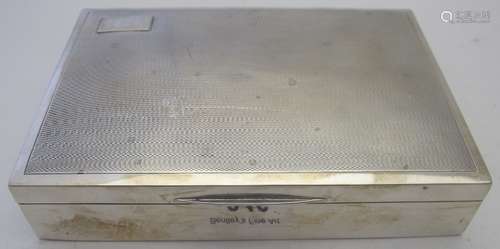 A silver cigarette box with engine turned design, Birmingham...