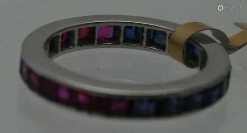 A tested 18ct white gold full eternity ring set with 1/2 sap...