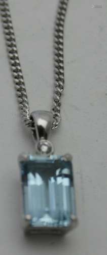 An 18ct white gold aquamarine and diamond pendant, aquamarin...