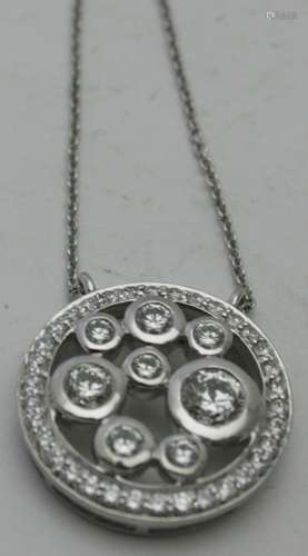 A fine diamond cluster slide pendant, probably 18ct white go...