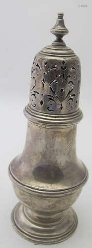 A silver sugar caster in a classical design with pierced dec...