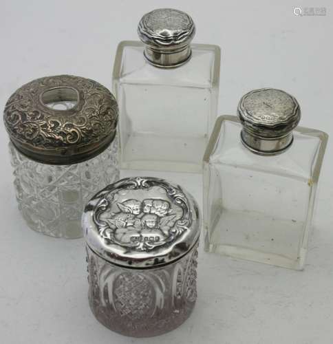 A pair of silver top rectangular glass bottles, Birmingham 1...