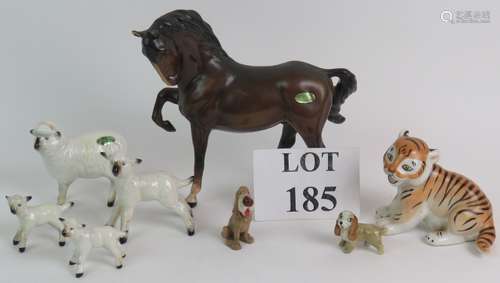 A Beswick Pottery horse, a Beswick Pottery sheep and three l...