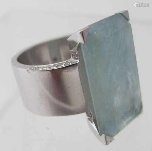 An 18ct white gold ring set with octagon Beryl-aquamarine we...