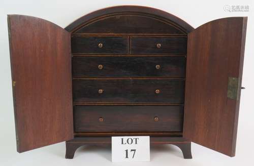 A George III dome topped six drawer cigar cabinet with two l...