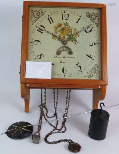 An antique 'open' Grandfather clock in contemporary case wit...